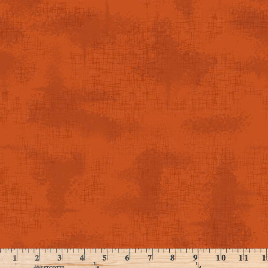 Autumn orange tonal fabric with thin, crosshatched lines and scattered specks.  Riley Blake Shabby Collection C600