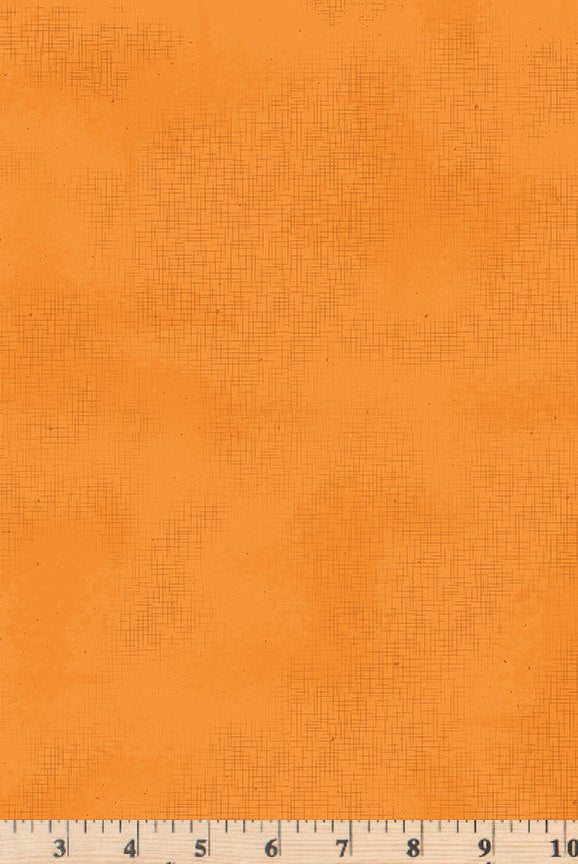 Pumpkin tonal fabric with thin, crosshatched lines and scattered specks.  Riley Blake Shabby Collection C608
