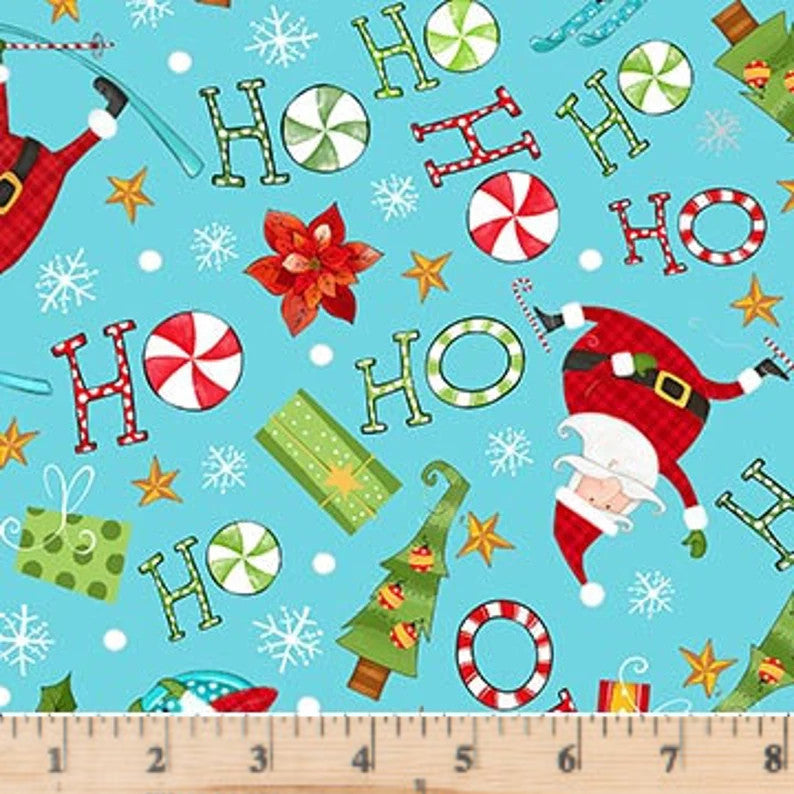 Santa participating in various winter sports, with a playful "Ho Ho Ho" scattered throughout on turquoise fabric. Extreme Santa Turquoise Multi Toss close up view.