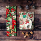 Peppermint Christmas fabric with cups, birds and fruit with scissors and wood counter.