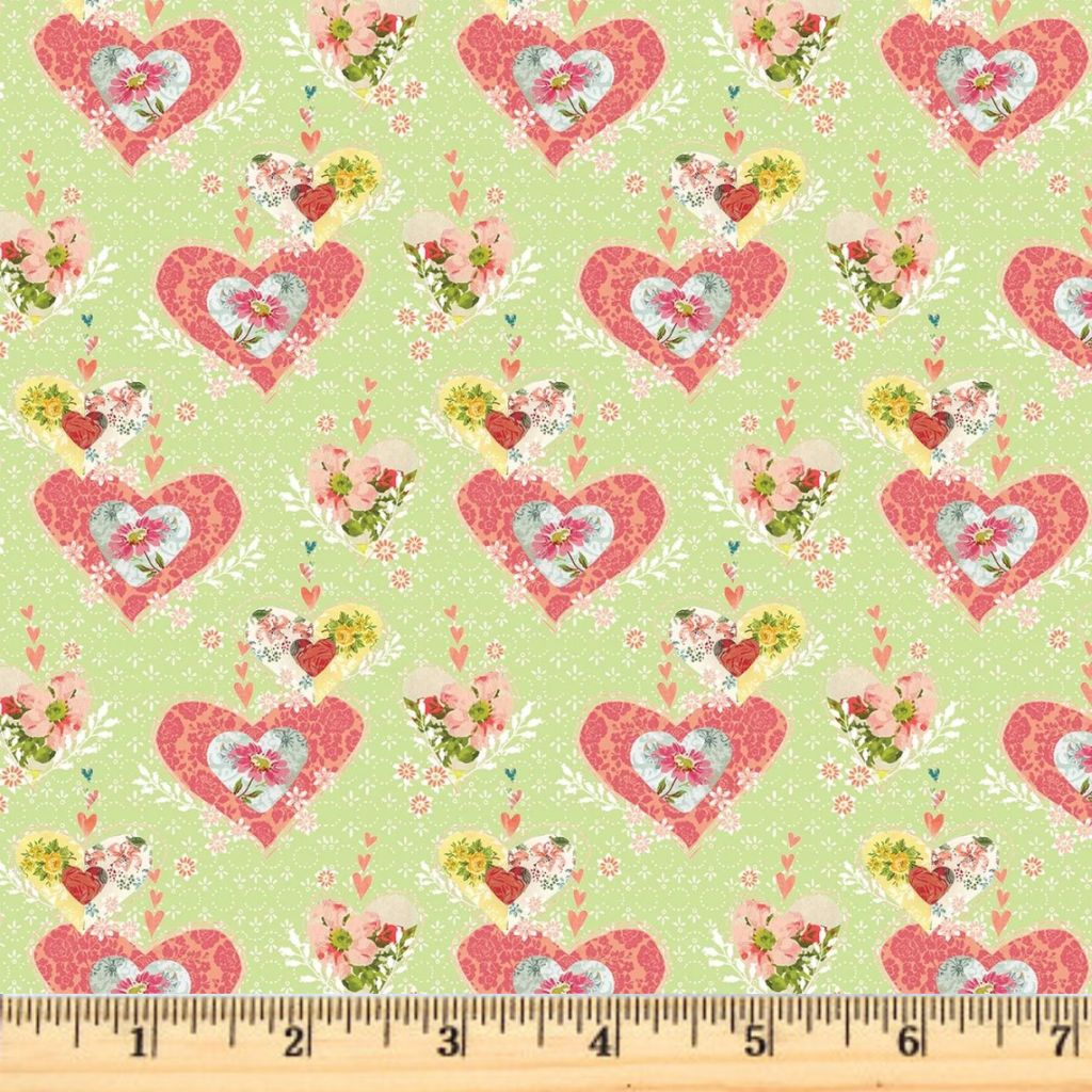 Coral hearts on light green 100% cotton fabric.  Be the Light Hearts light green